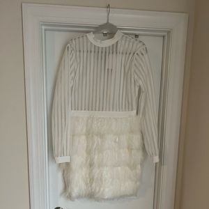 White feather mini dress. Long sleeved